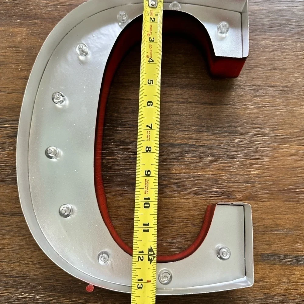 Industrial, light-up, free-standing, C initial decoration